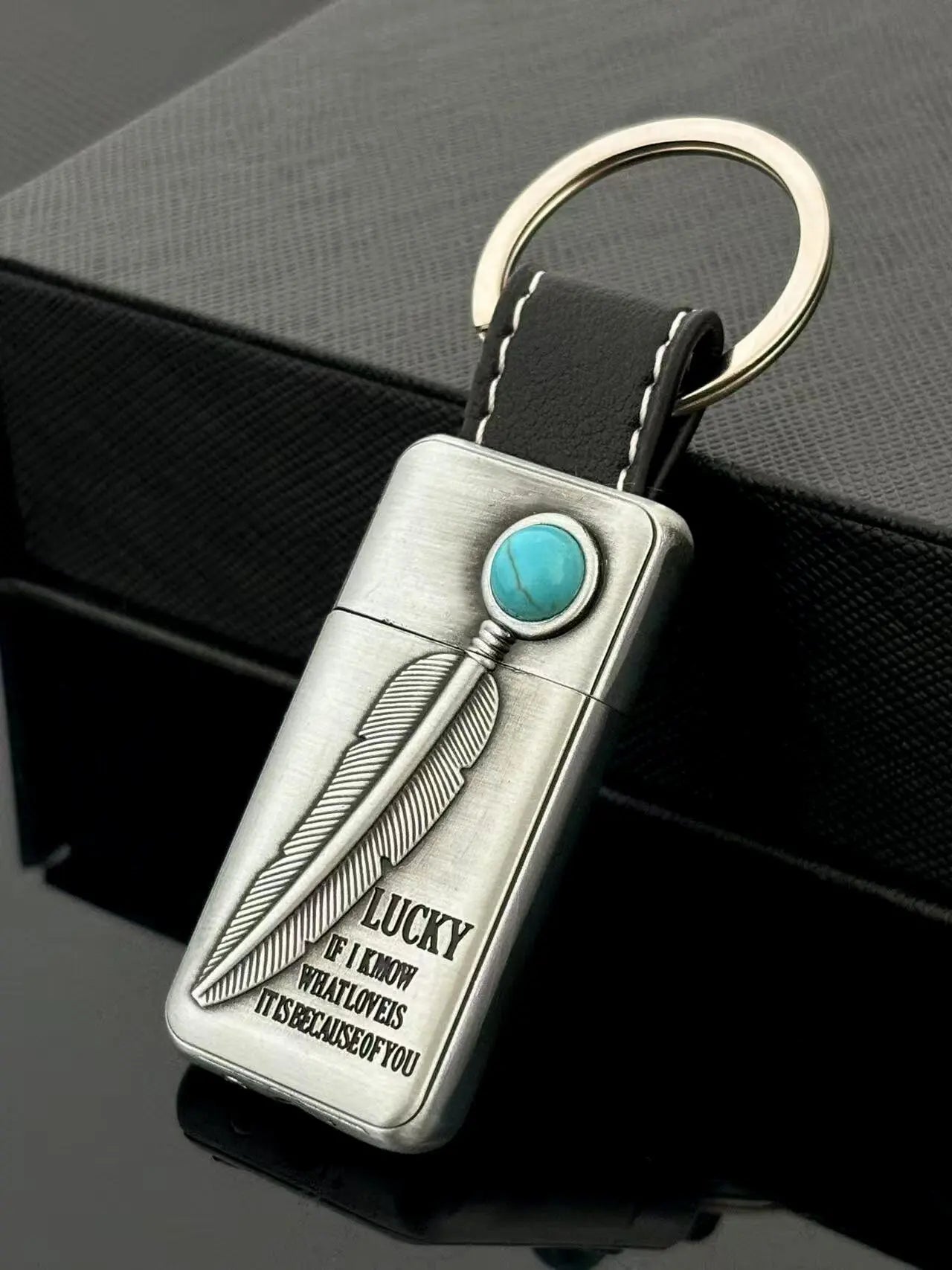 The windproof flame of the Turquoise Stone Vintage Metal Keychain Lighter in action