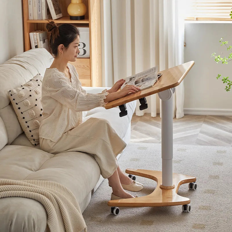 Work Everywhere Ergonomic Adjustable Rolling Desk in use