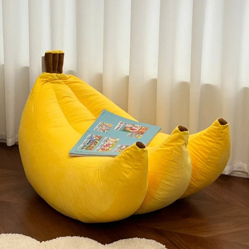 Person relaxing on the Tatami Banana Lazy Sofa Chair