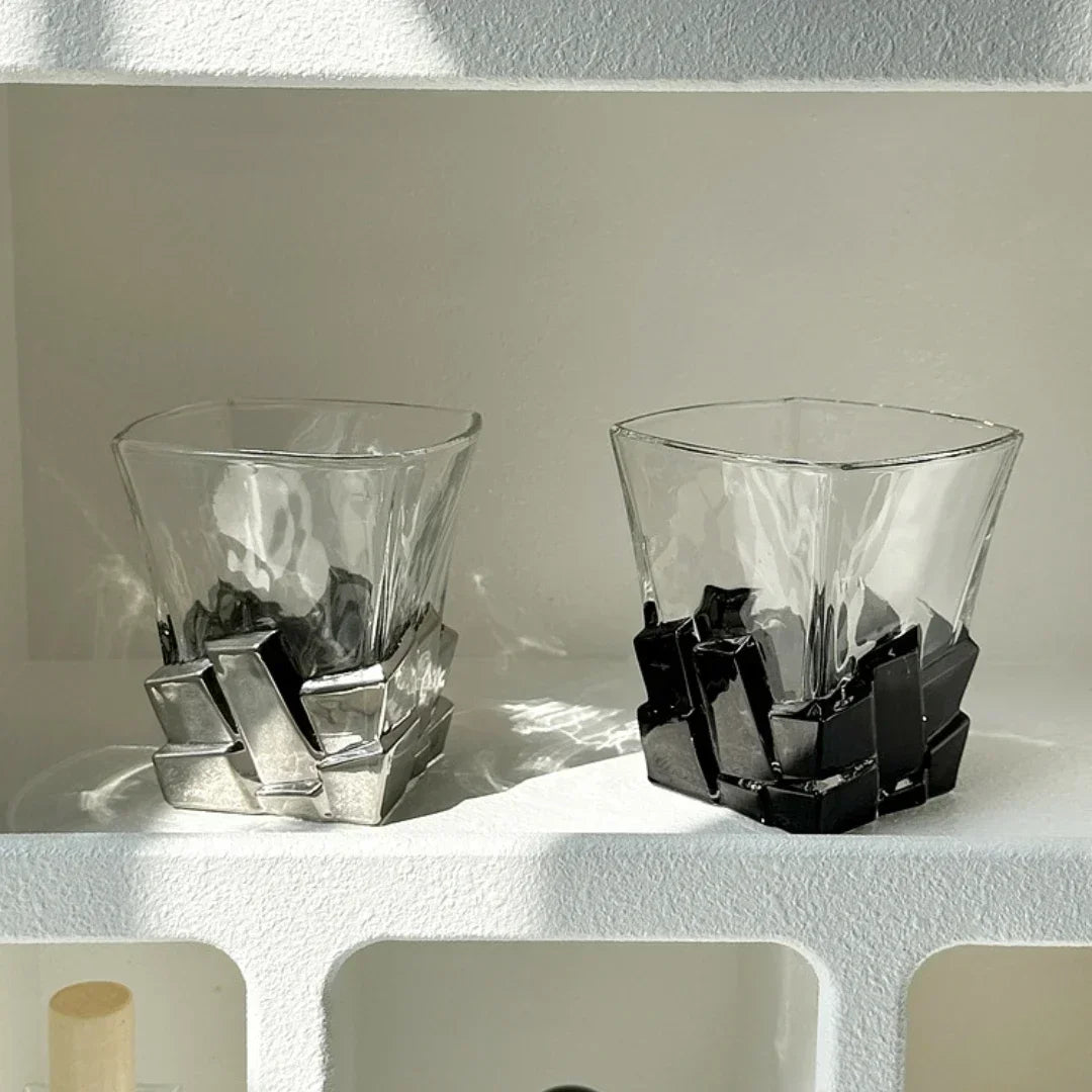 A stylish presentation of a drink in the Geometric Onyx Base Glass Cup
