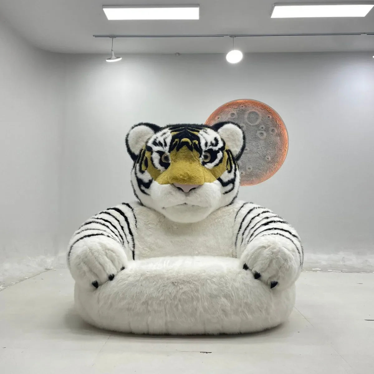Person relaxing comfortably in the Giant Tiger Cozy Lounge Chair