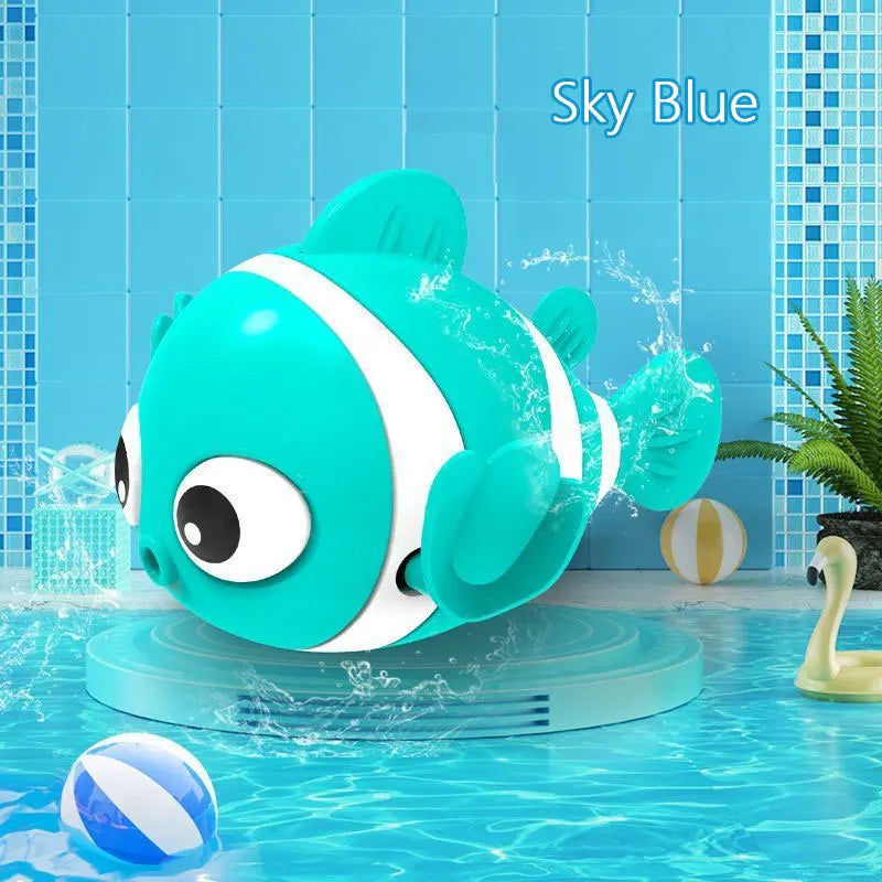 A child happily playing with the interactive dolphin toy in a bathtub