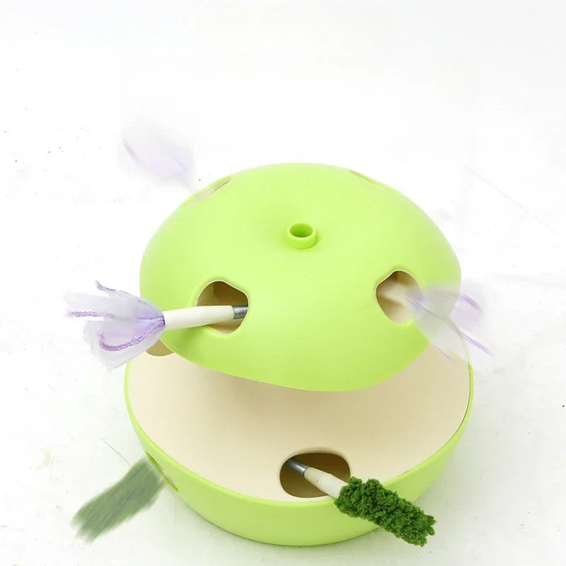 Detailed view of the automatic cat toy's feather teaser feature