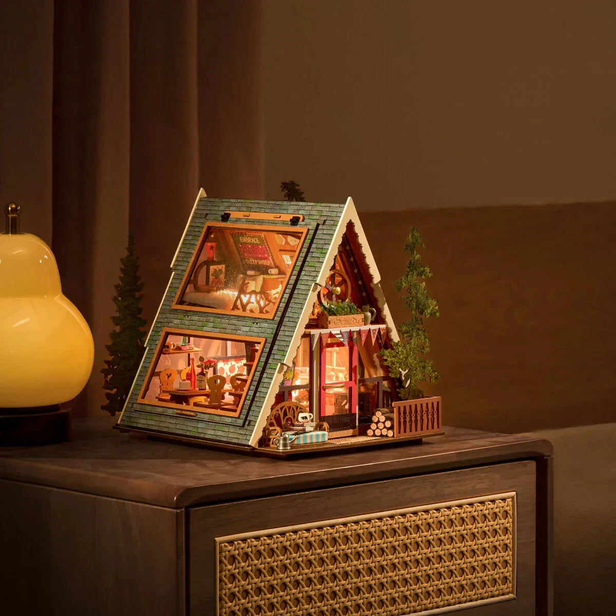 Assembling the miniature cabin kit piece by piece