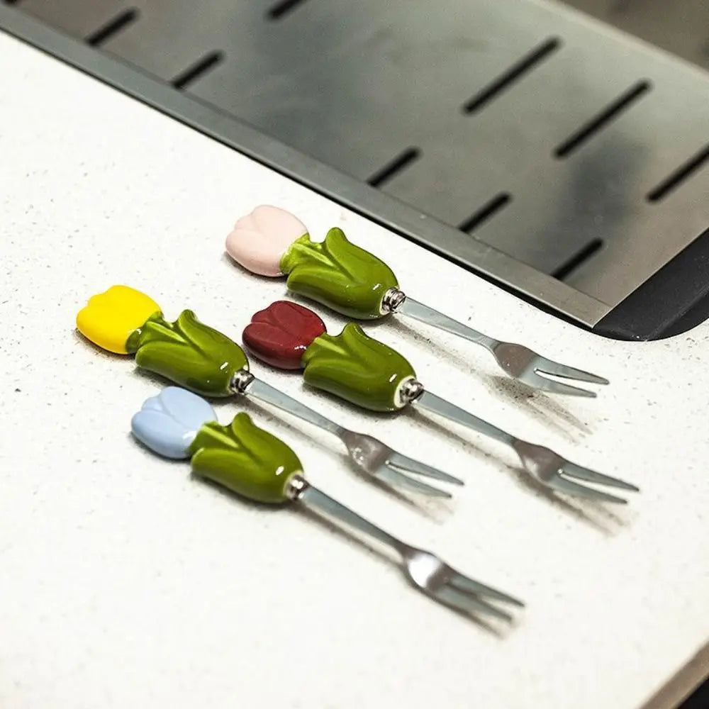 Close-up view of the tulip-shaped stainless steel forks
