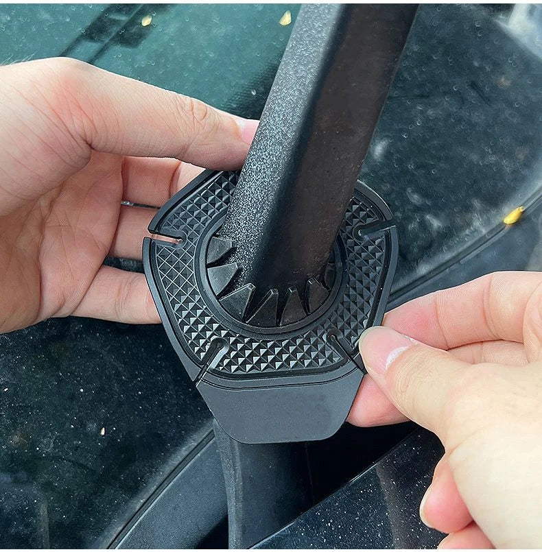 Protective universal seal wiper cover installed on a car windshield