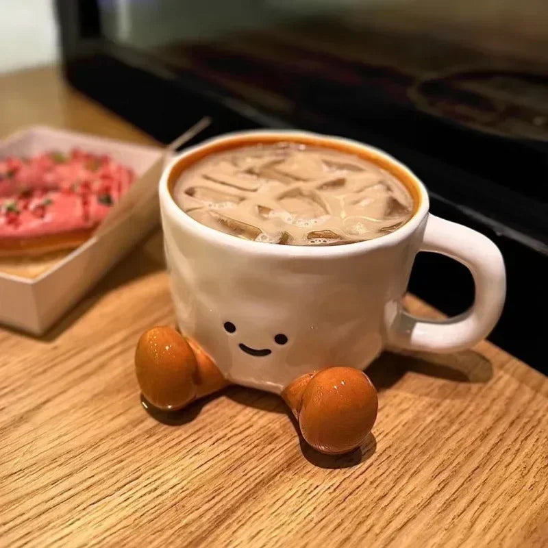 Happy Cute Face Ceramic Mug as a home essential decor piece on a shelf
