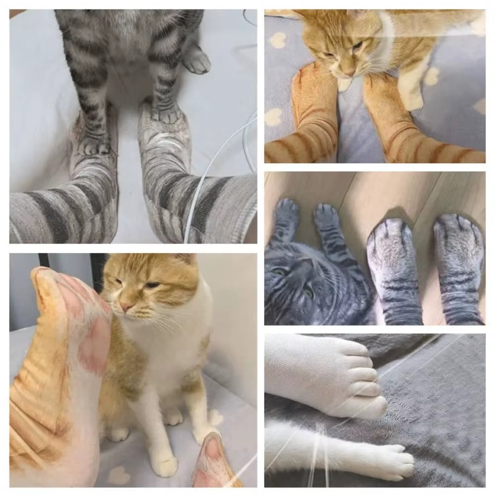 A person showing off their realistic cat paw socks on a wooden floor