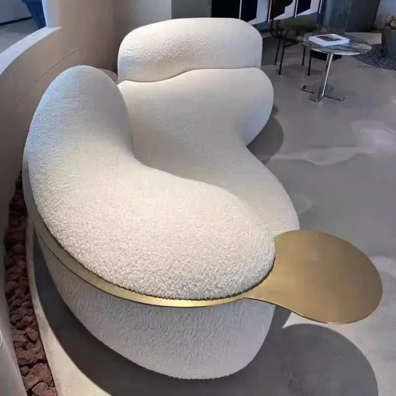 Nordic Style Sculptural Curved Artistic Lounge Sofa in a minimalist living room