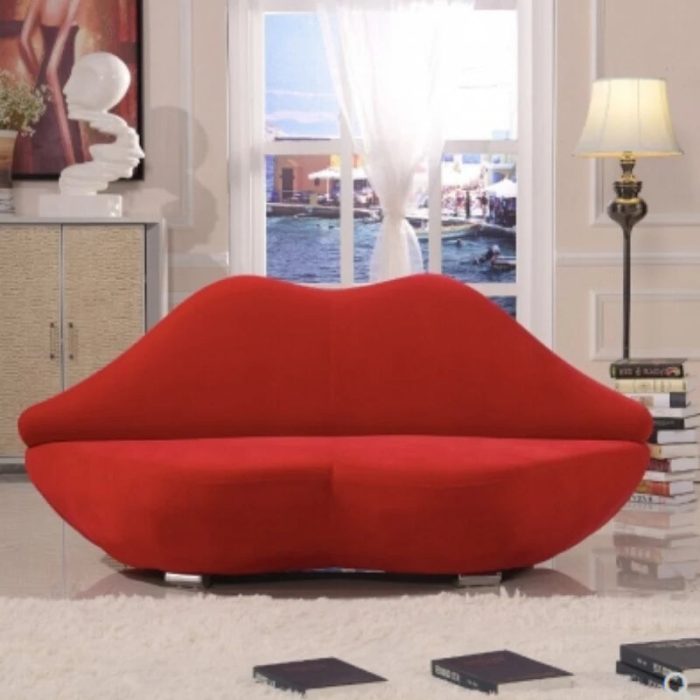Playful red lip shaped loveseat for a bold statement