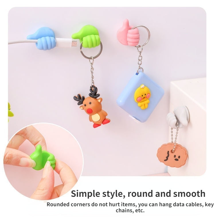 Close-up of the Thumbs-up Multifunctional Sticky Wall Hook design