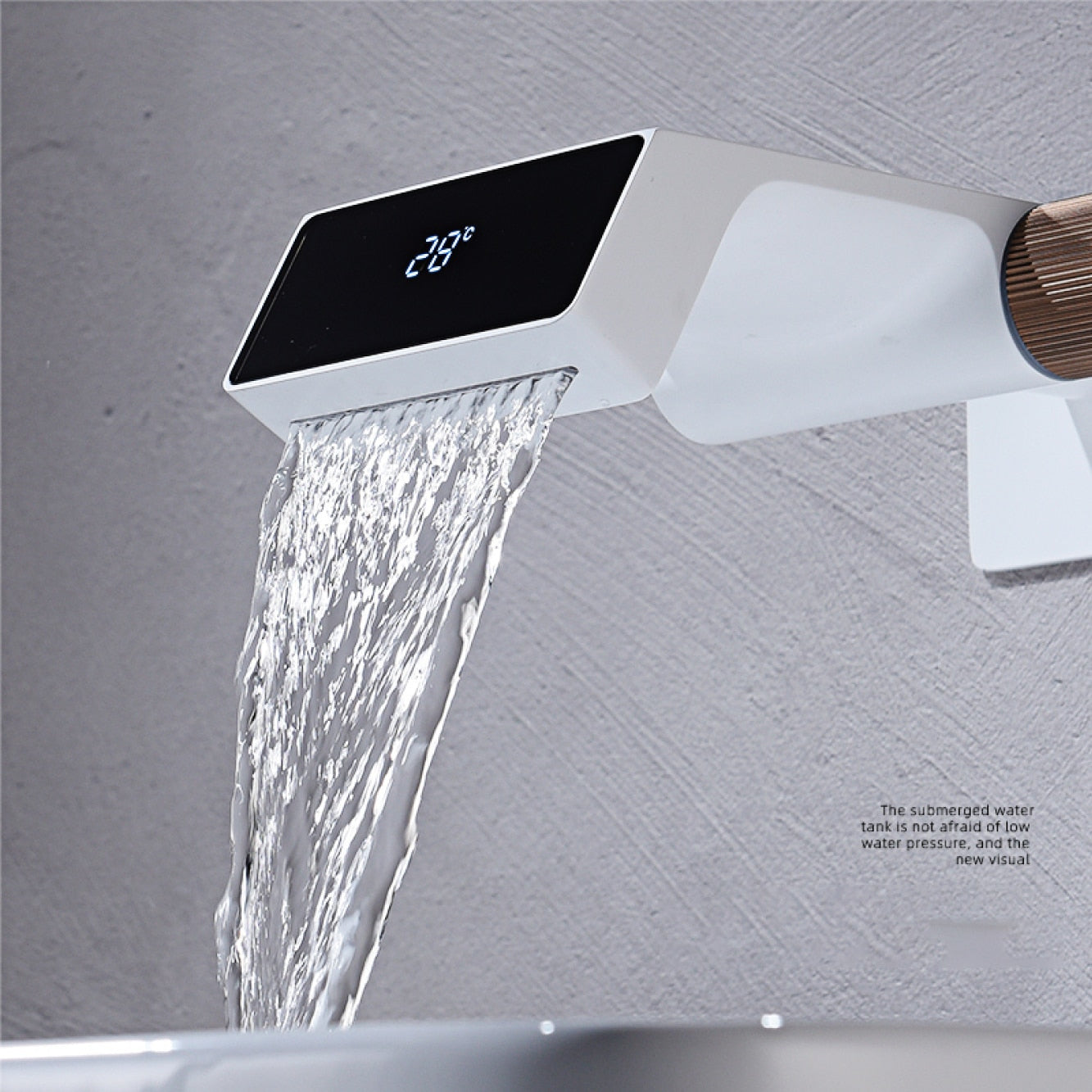 The futuristic bathroom faucet installed on a white basin, showcasing its elegant design.