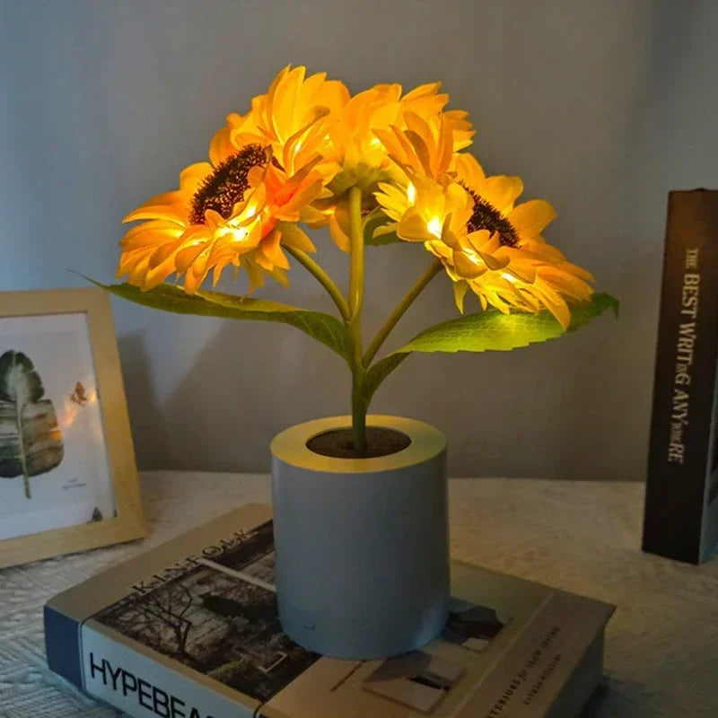 Close-up of the glowing sunflower lamp showing its warm light.