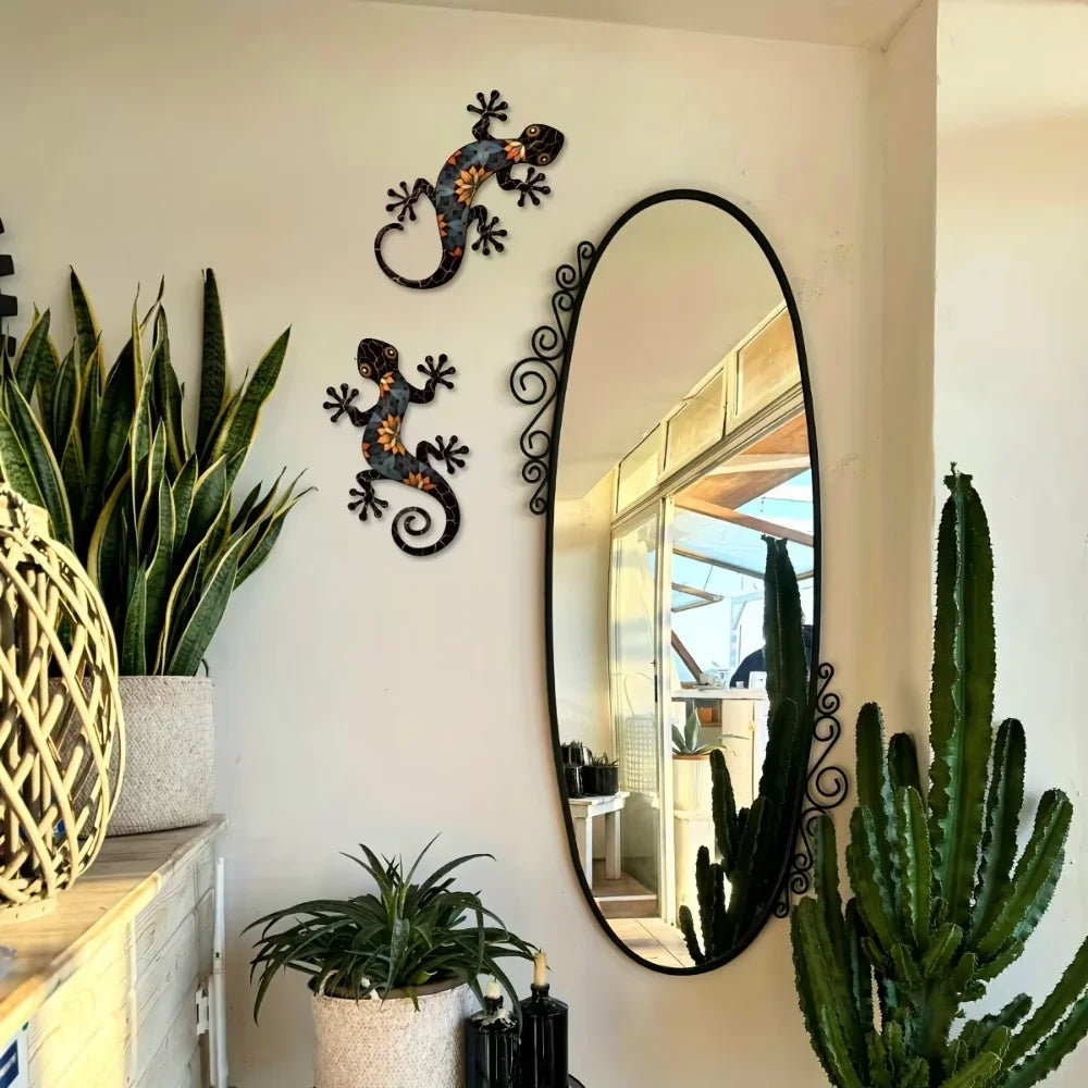The metal gecko decor adding personality to a garden wall