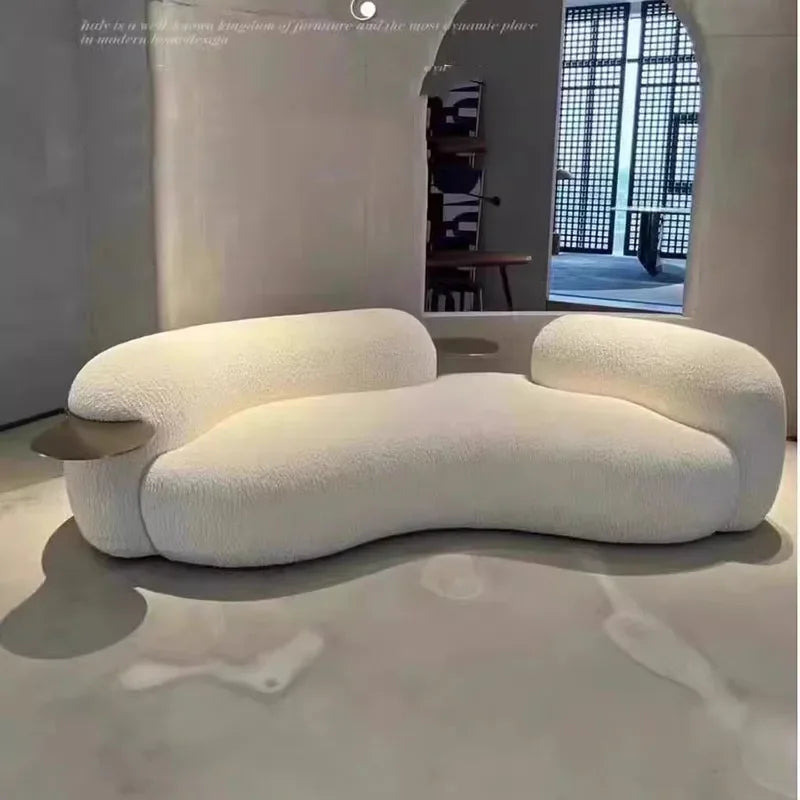 Close-up of the sofa's curved design showcasing its artistic form