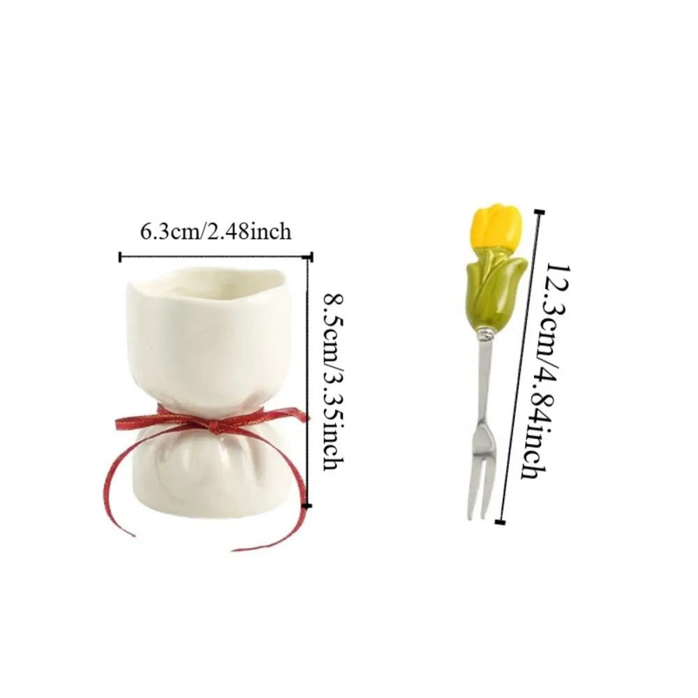 Detailed view of the ceramic jar and stainless steel fork set
