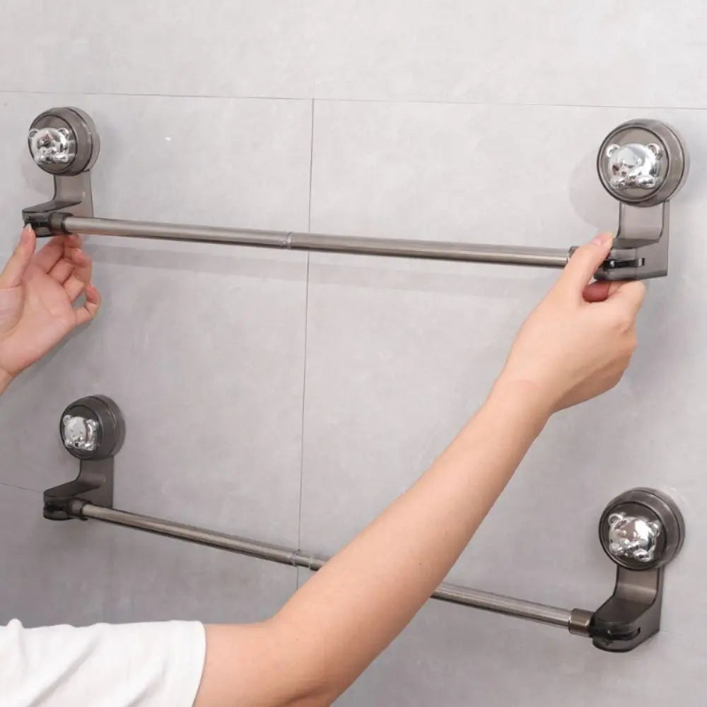 Demonstration of the Stick & Store rack holding multiple towels