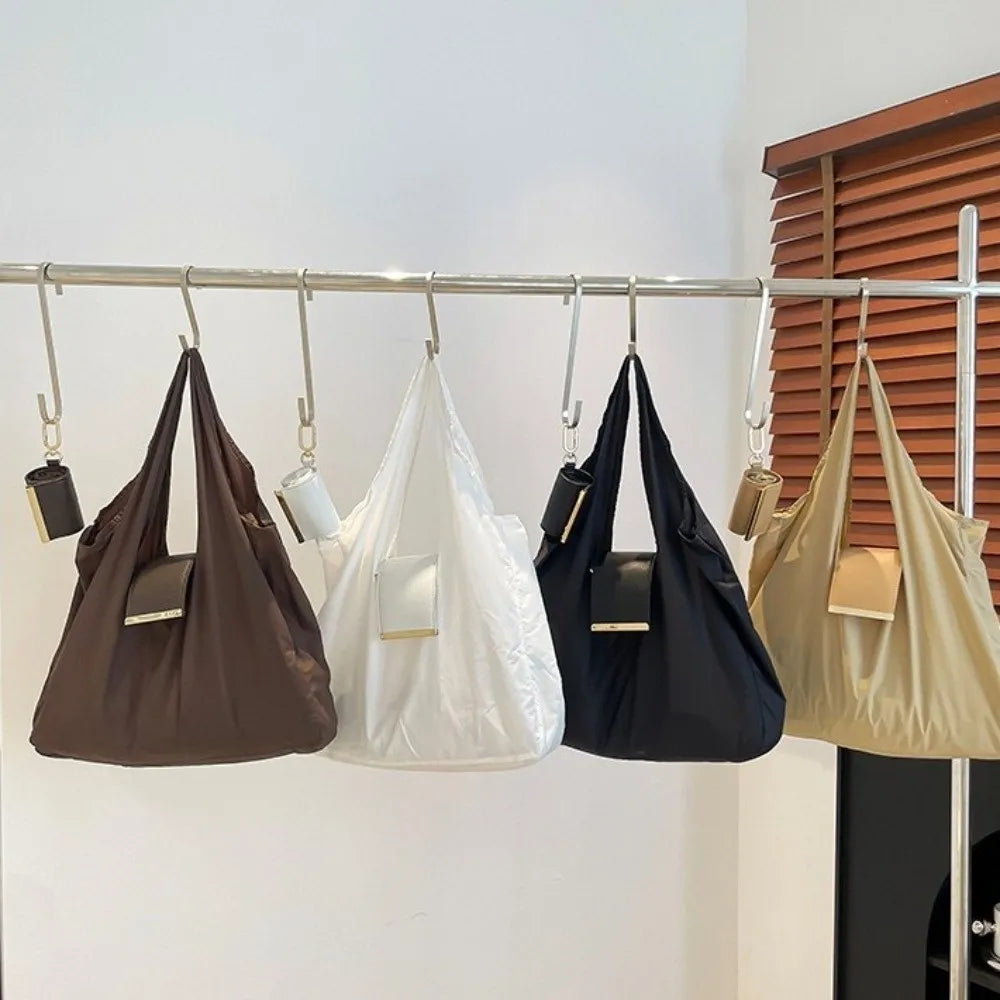 Diagram showing the easy steps to expand the pocket tote bag