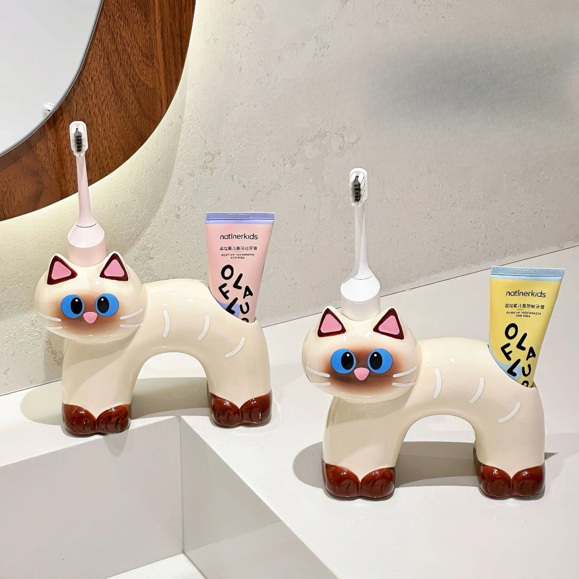 Adorable white cat toothbrush holder as a unique gift idea