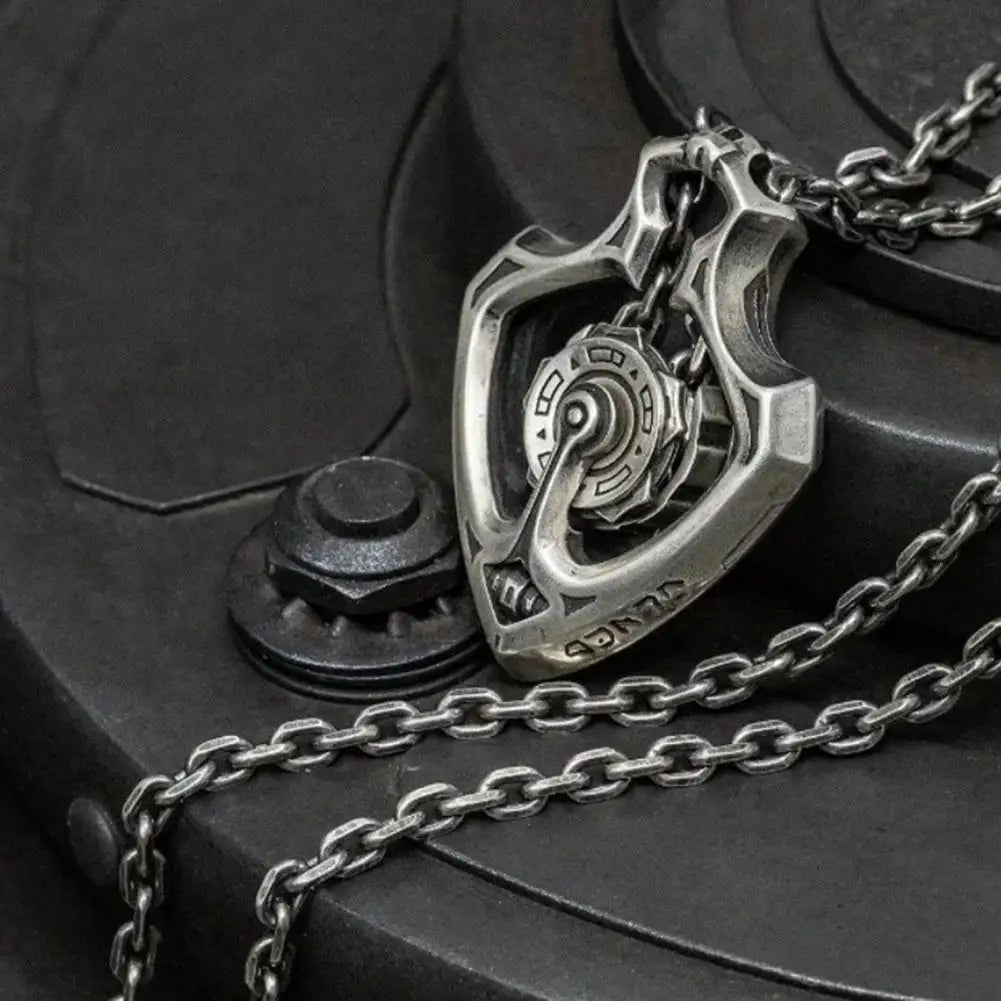 Close-up view of the intricate rotating gears on the vintage necklace