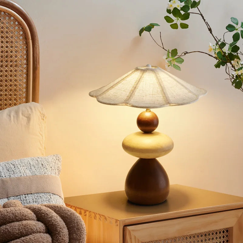 The Zen Style Wooden Table Lamp on a modern bedside table
