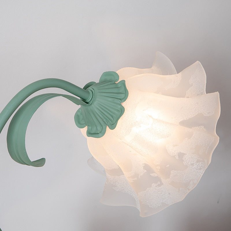 Close-up of the flower-shaped frosted glass shade on the Nordic lamp