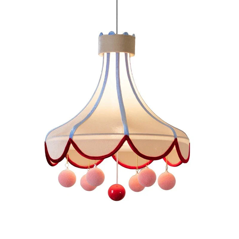 Detailed view of the fabric and construction of the pom-pom lamp