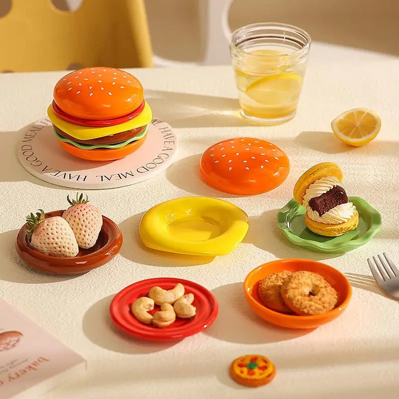Family using the fun hamburger plate set at a picnic outdoors