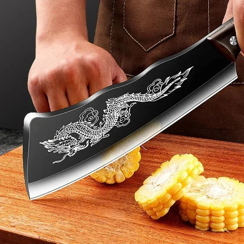 Close-up of the intricate dragon engraving on the stainless steel blade