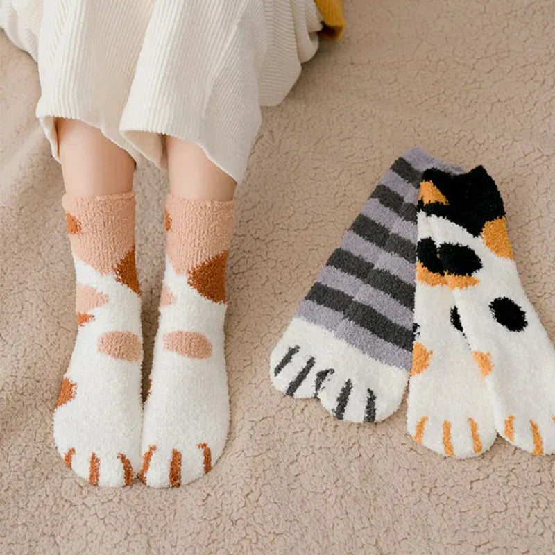 Multiple pairs of the Plush Winter Cute Cat Paws Sock in different colors