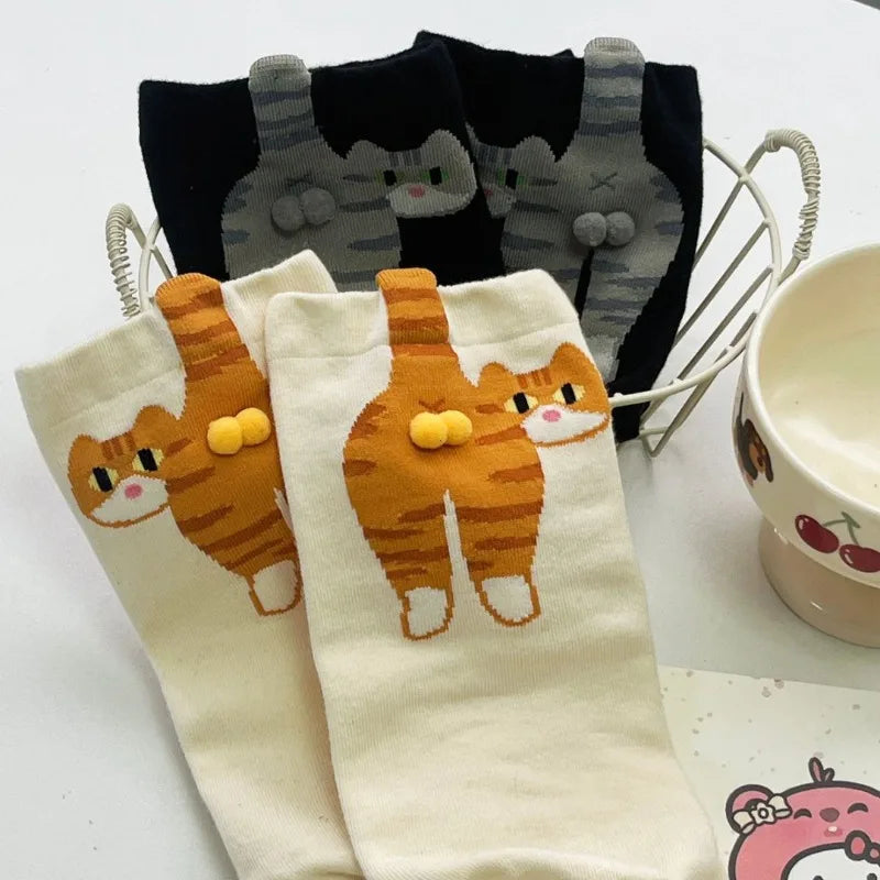 A collection of Cute Cat Butt Cartoon Socks showcasing different colors and designs