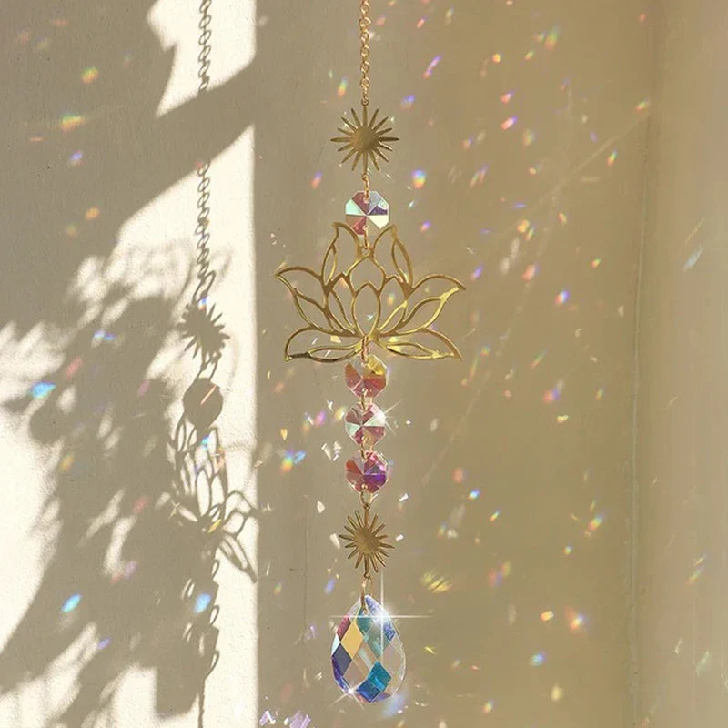 Lotus Crystal Sun Catcher creating vibrant rainbow prisms on a wall