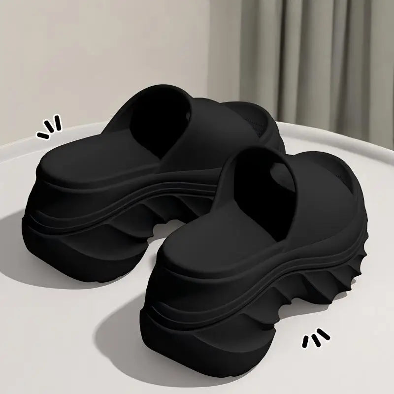 Person wearing the platform slippers with casual jeans