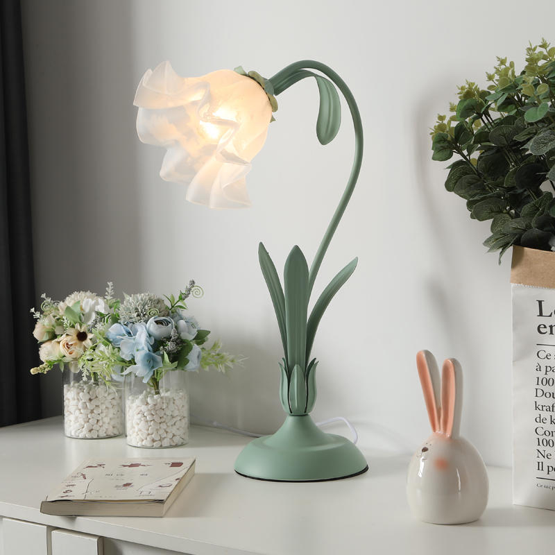 A stylish shot of the green Nordic table lamp in a modern room setting