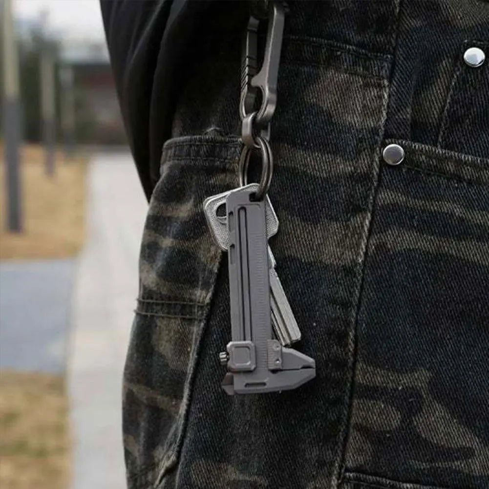 Using the Mini Ranger pocket tool as a bottle opener on a glass bottle