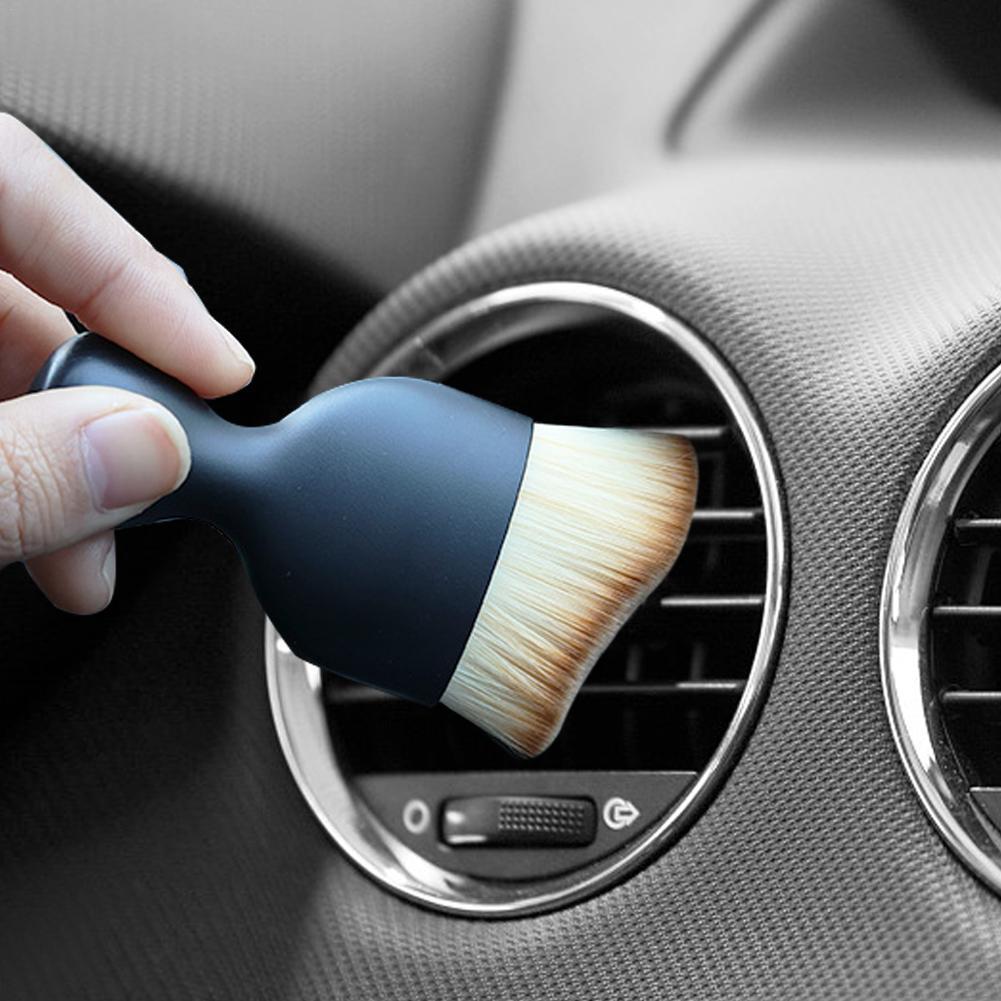 Compact Car Interior Dashboard Cleaning Brush held in hand