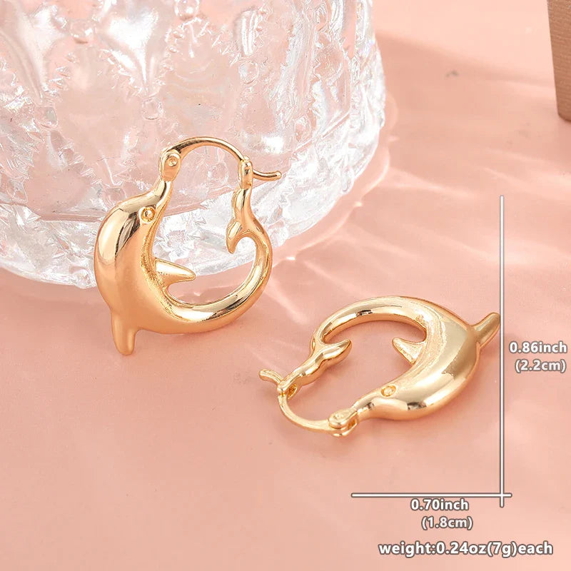 Detailed view of the copper-based metal dolphin earrings