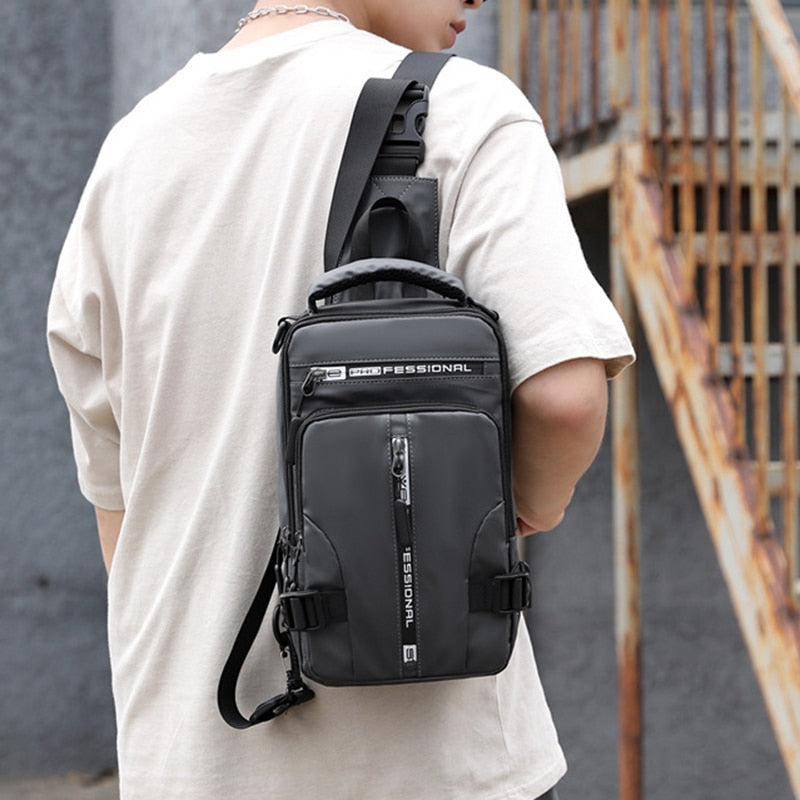 Sleek black crossbody bag with USB charging port shown on a model