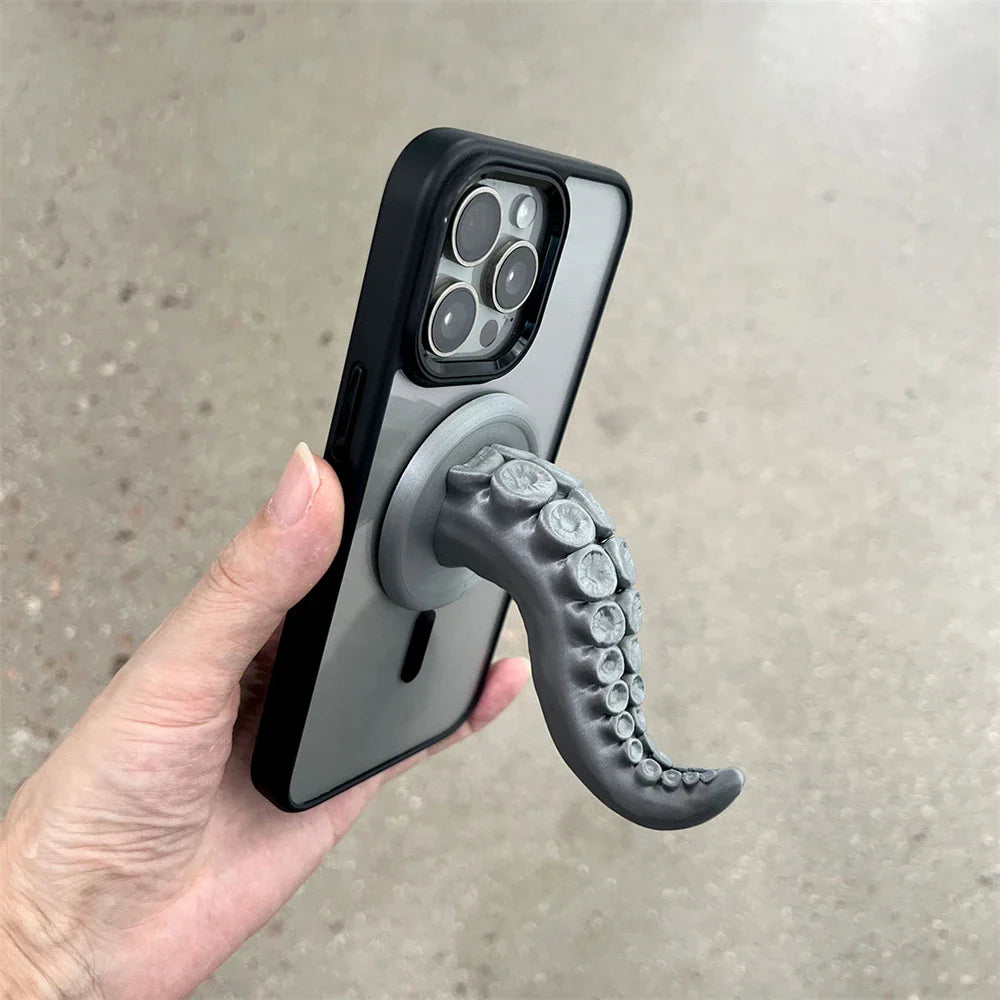 The octopus phone stand shown in multiple colors on a clean background