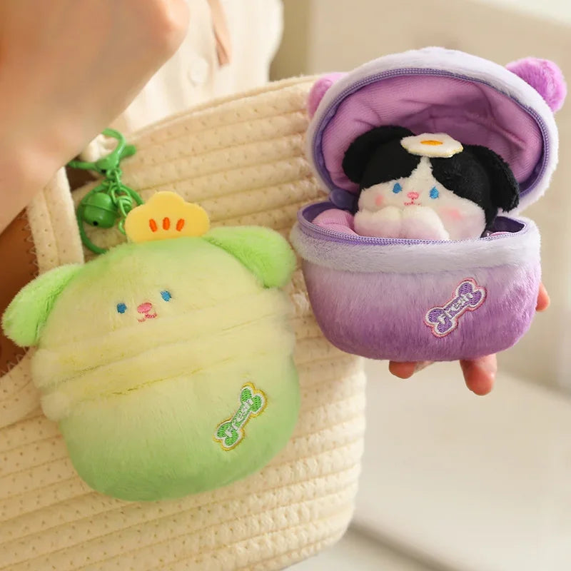 A person holding the soft dinosaur plush keychain to show its size and cuteness.
