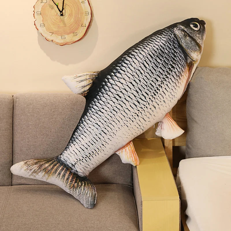 Giant Fish Plush Realistic Pillow on a sofa