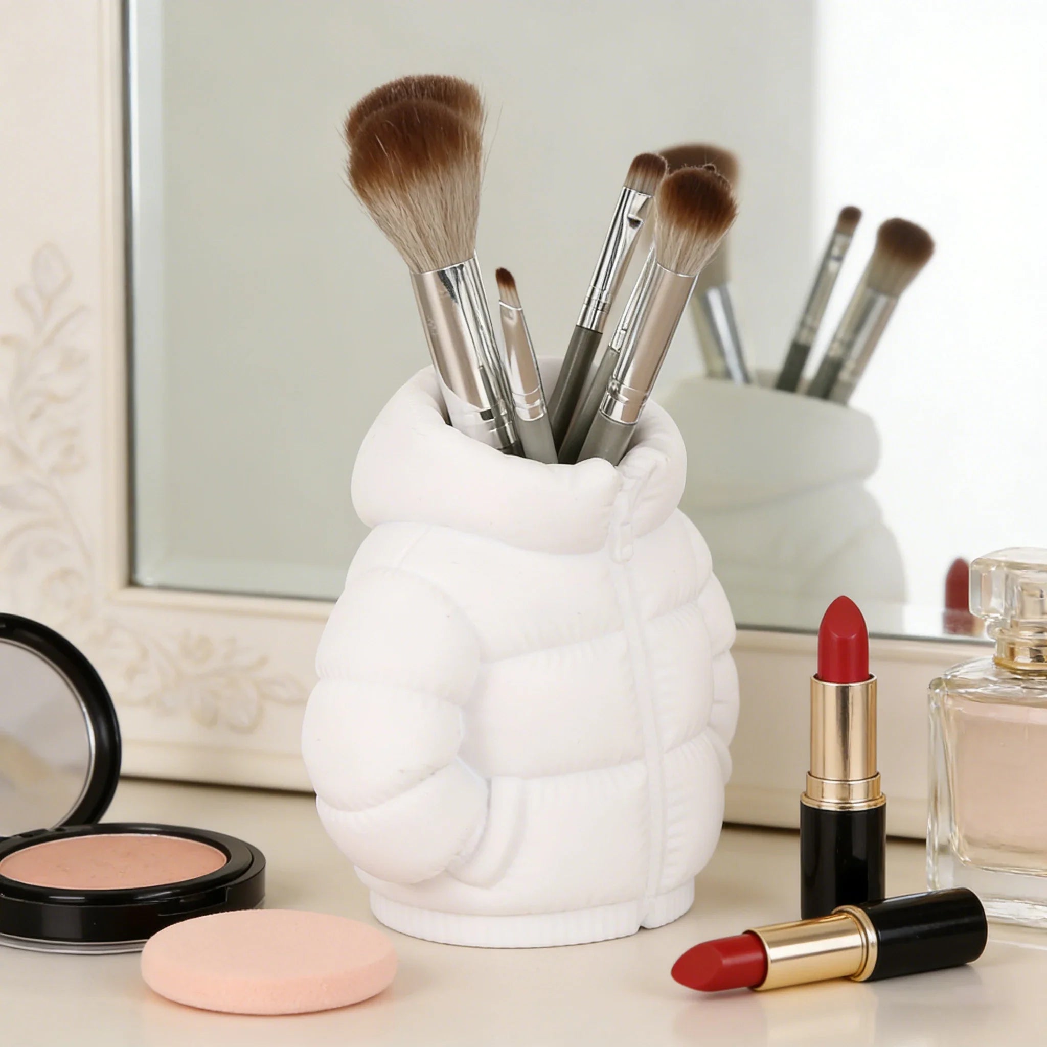 Playful desk setup featuring the puffer jacket pen holder for students