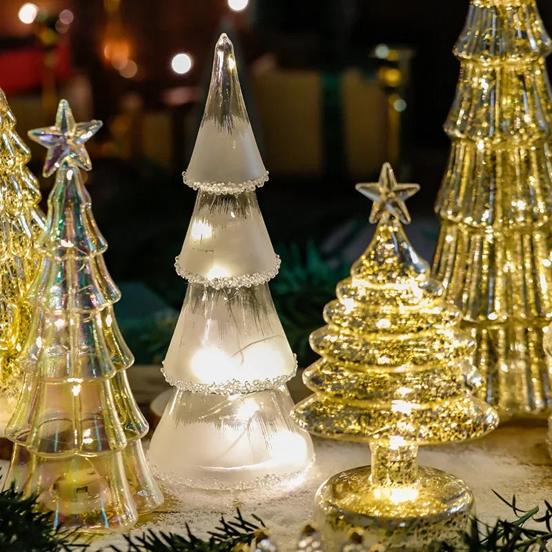A group of Christmas Time LED Frosted Glass Tree Lamps creating a festive centerpiece