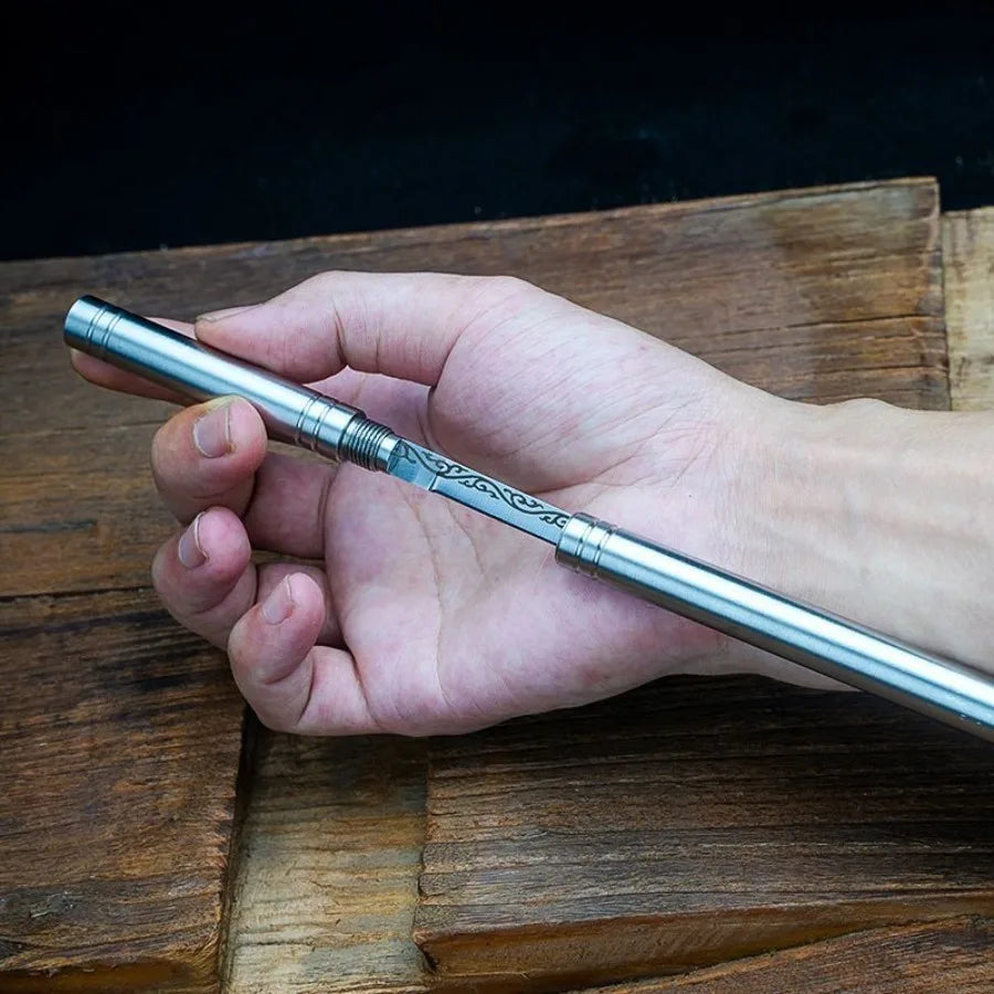 Mini pocket knife shown in hand for scale