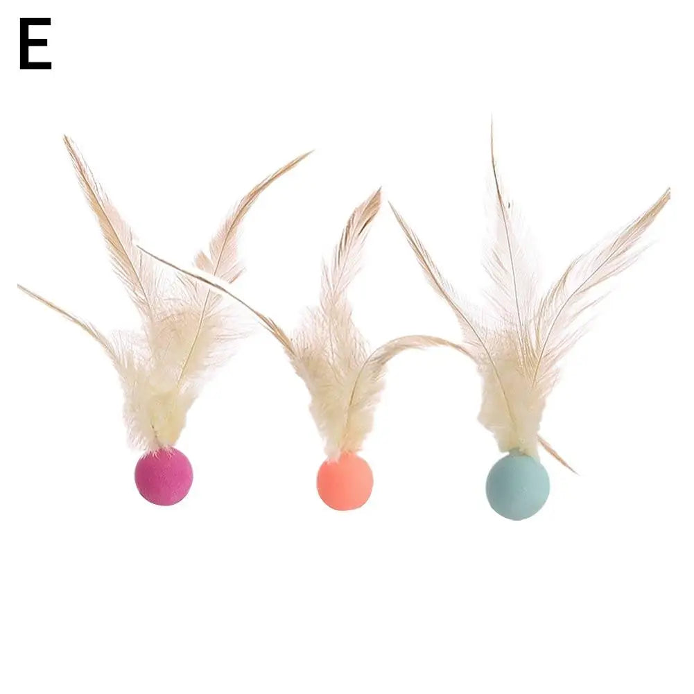 Cat playing enthusiastically with the Feather Ball toy, showcasing its interactive nature