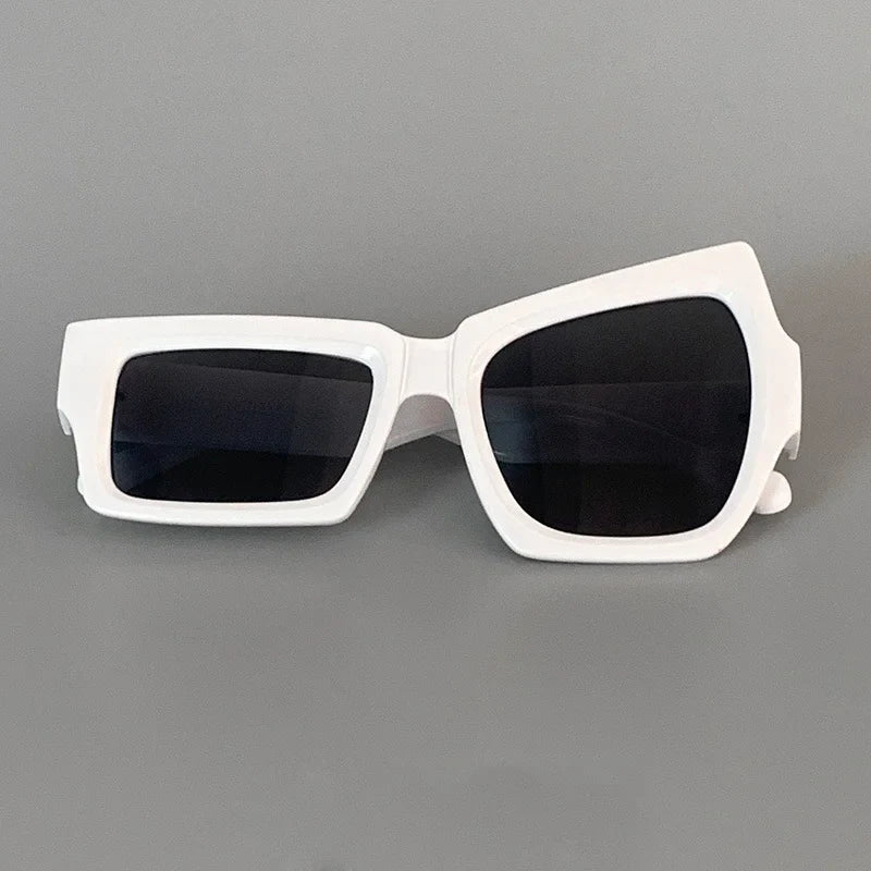 Close-up view of the durable polycarbonate frame on the geometric sunglasses