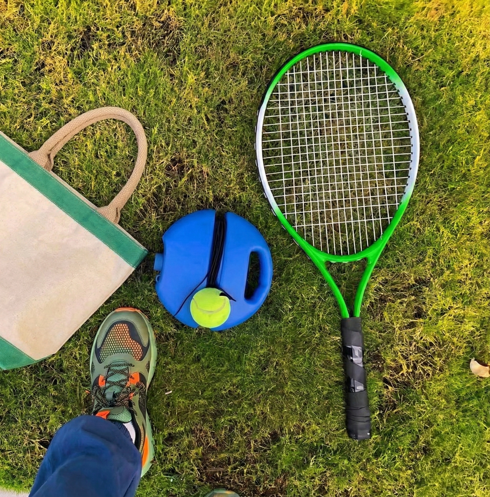 Close-up of the Tennis Self Training Tool base and ball