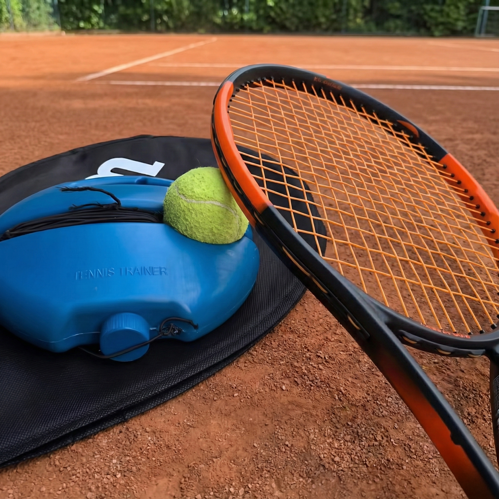 Tennis Self Training Tool in action in a driveway