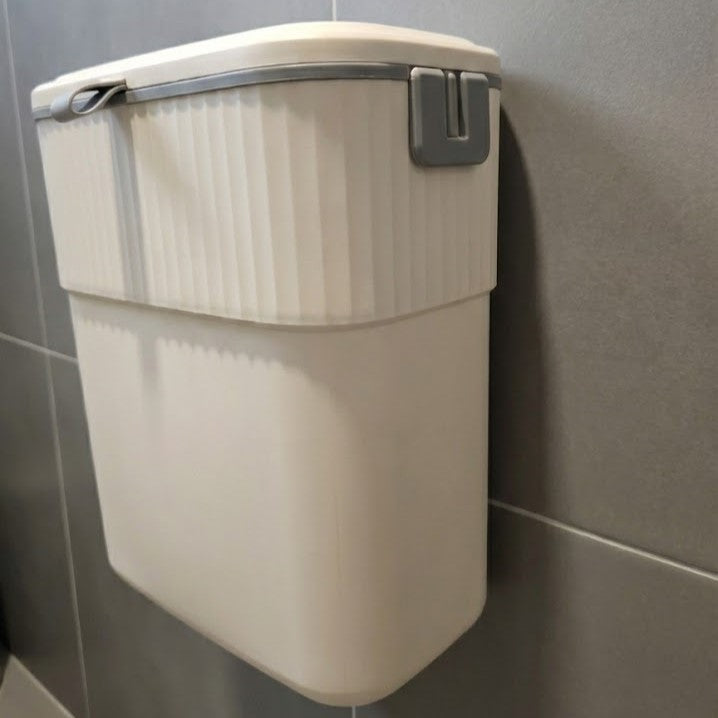 Hands-Free Self Sealing Smart Trash Can mounted on a kitchen cabinet