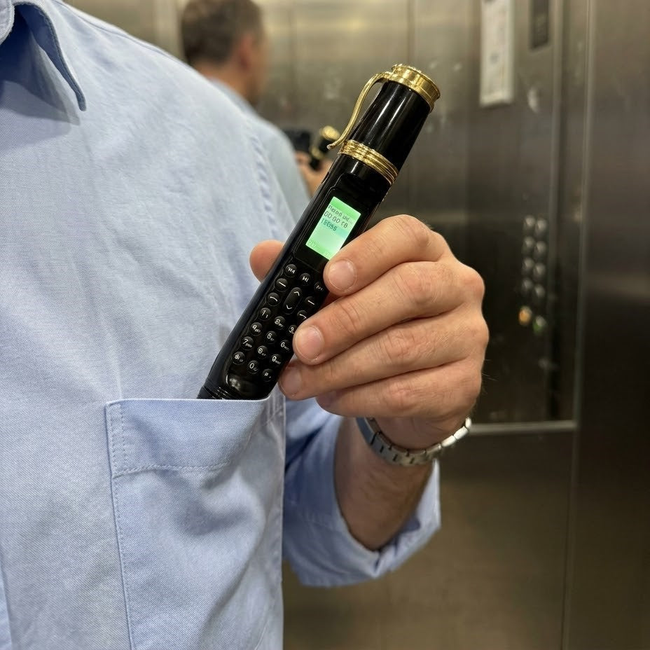 The SpyLine Pen Phone shown in its box, an ideal gift for tech lovers